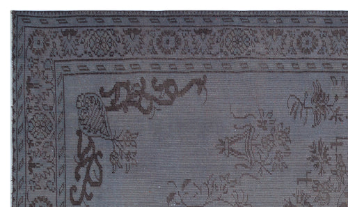 Load image 1 in gallery view. Charcoal grey rug with a dark brown traditional floral border and central medallion pattern.
