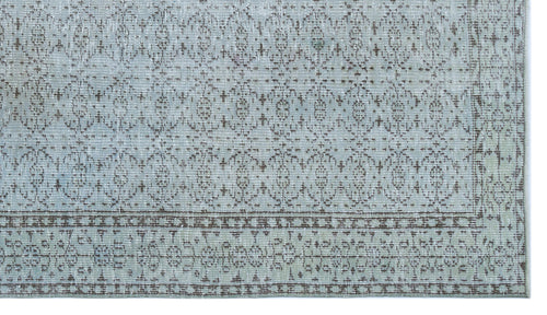 Load image 1 in gallery view. Light blue and brown rug with a distressed traditional medallion pattern and a detailed geometric border.