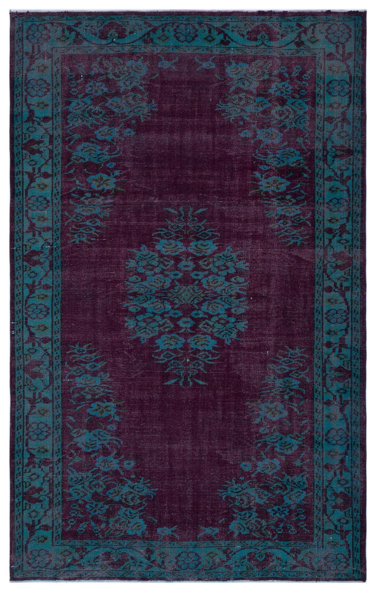 Deep purple and teal traditional rug with a central floral medallion and ornate botanical border.
