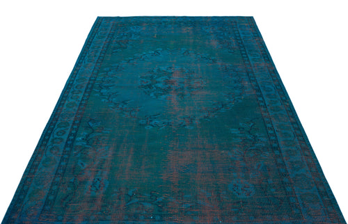 Load image 1 in gallery view. Teal and dark blue distressed rug with a central medallion and traditional border pattern on a white background.