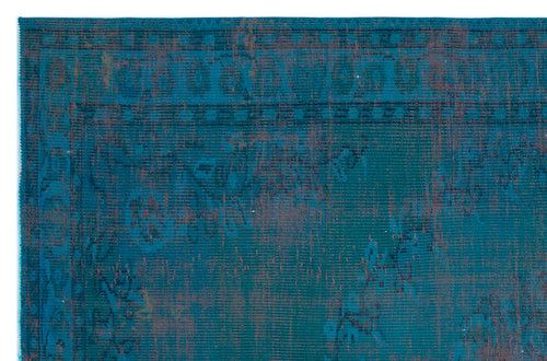 Load image 1 in gallery view. Teal and rust-colored distressed rug with a traditional border and faded floral pattern.
