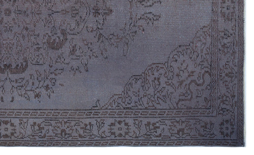 Load image 1 in gallery view. Dark charcoal monochromatic rug with a traditional floral medallion pattern and a detailed border.