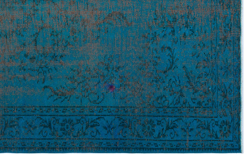 Load image 1 in gallery view. Teal and brown distressed rug with a traditional floral medallion pattern and a detailed border.
