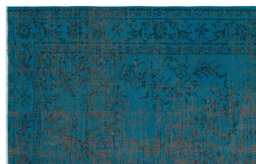 Load image 1 in gallery view. Teal and dark brown rug with a distressed traditional floral medallion pattern and a decorative border.