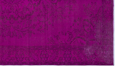 Load image 1 in gallery view. Magenta rug with a dark, distressed floral medallion pattern and a decorative border.