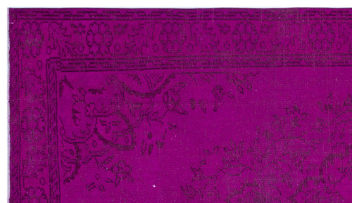 Load image 1 in gallery view. Magenta rug with a dark purple traditional floral medallion border and intricate botanical pattern.