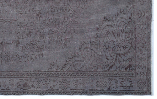 Load image 1 in gallery view. Charcoal grey rug with a subtle, tonal traditional floral medallion pattern and a detailed geometric border.