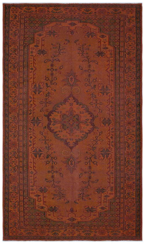 Load image 1 in gallery view. Rust-colored traditional rug with a central medallion and dark green geometric border patterns on a white background.