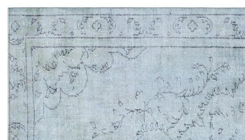 Load image 1 in gallery view. Light blue distressed rug with a faded charcoal grey traditional floral border and medallion pattern.