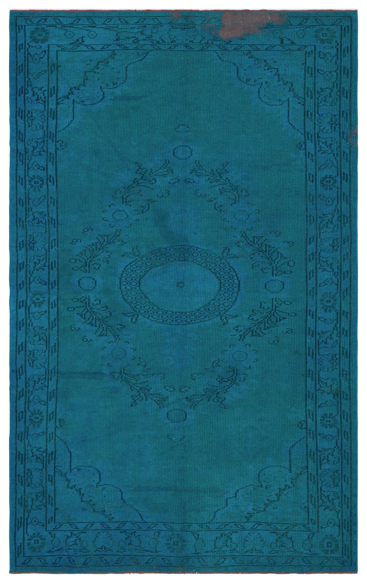 Teal monochromatic rug with a central medallion and floral border pattern on a white background.