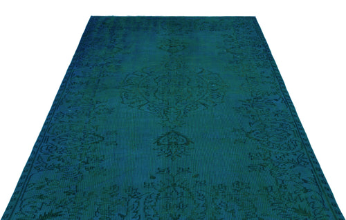 Load image 1 in gallery view. Deep teal vintage-style rug with a dark, tonal floral medallion pattern on a white background.