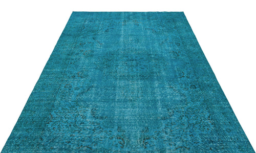 Load image 1 in gallery view. Teal distressed vintage-style rug with a faded central medallion and ornate border pattern on a white background.