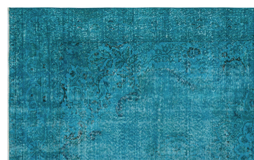 Load image 1 in gallery view. Teal distressed rug with a faded traditional floral medallion pattern.