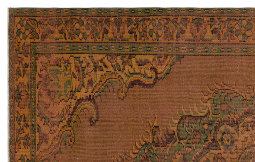 Load image 1 in gallery view. Rust-colored traditional rug with a dark green and brown ornate floral border and corner medallion detail.