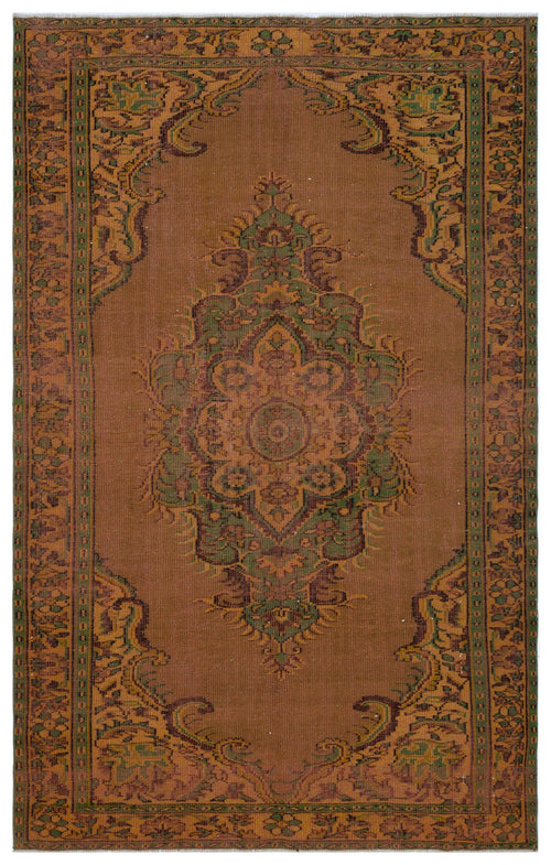 Load image 1 in gallery view. Brown and green traditional rug with a central floral medallion and ornate border pattern.
