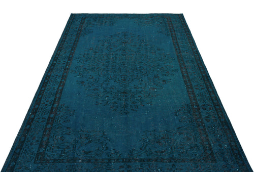 Load image 1 in gallery view. Teal and black distressed rug with a traditional central medallion and ornate border pattern on a white background.