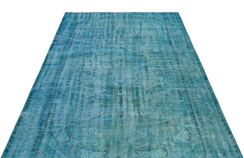 Load image 1 in gallery view. Teal distressed area rug with a faded traditional medallion pattern on a white background.