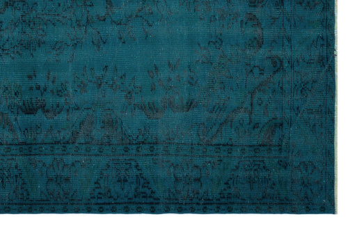 Load image 1 in gallery view. Teal rug with a dark, distressed traditional floral medallion pattern and a bordered edge.
