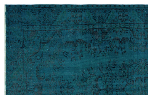 Load image 1 in gallery view. Teal rug with a dark, distressed traditional floral medallion pattern and a bordered edge.