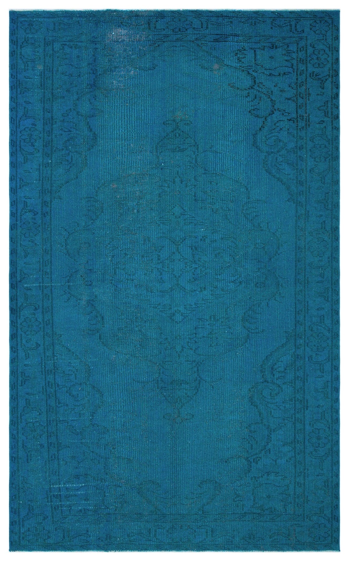 Monochromatic teal rug with a faint, traditional Persian-style medallion and border pattern.