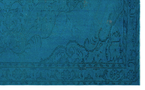 Load image 1 in gallery view. Teal rug with a dark blue traditional floral medallion pattern and a detailed border.
