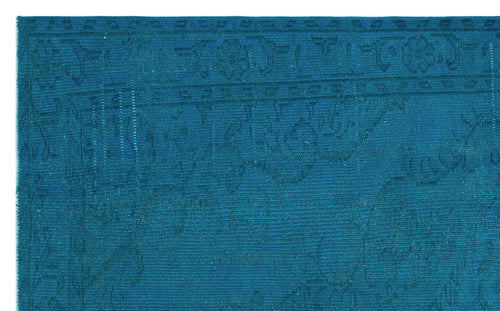 Load image 1 in gallery view. Teal monochromatic rug with a subtle, tone-on-tone traditional floral border and medallion pattern.