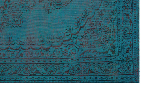 Load image 1 in gallery view. Teal rug with a dark brown traditional floral medallion pattern and a geometric border.