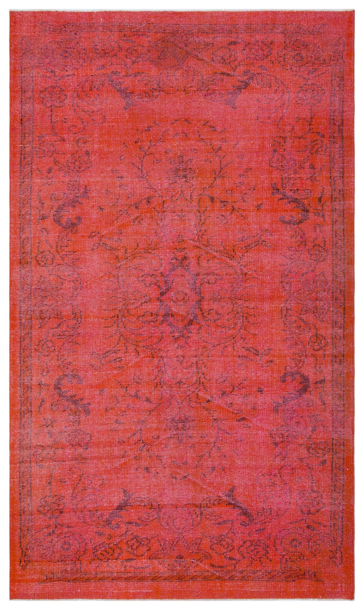 Vibrant red distressed rug with a dark charcoal floral medallion pattern and a decorative border.