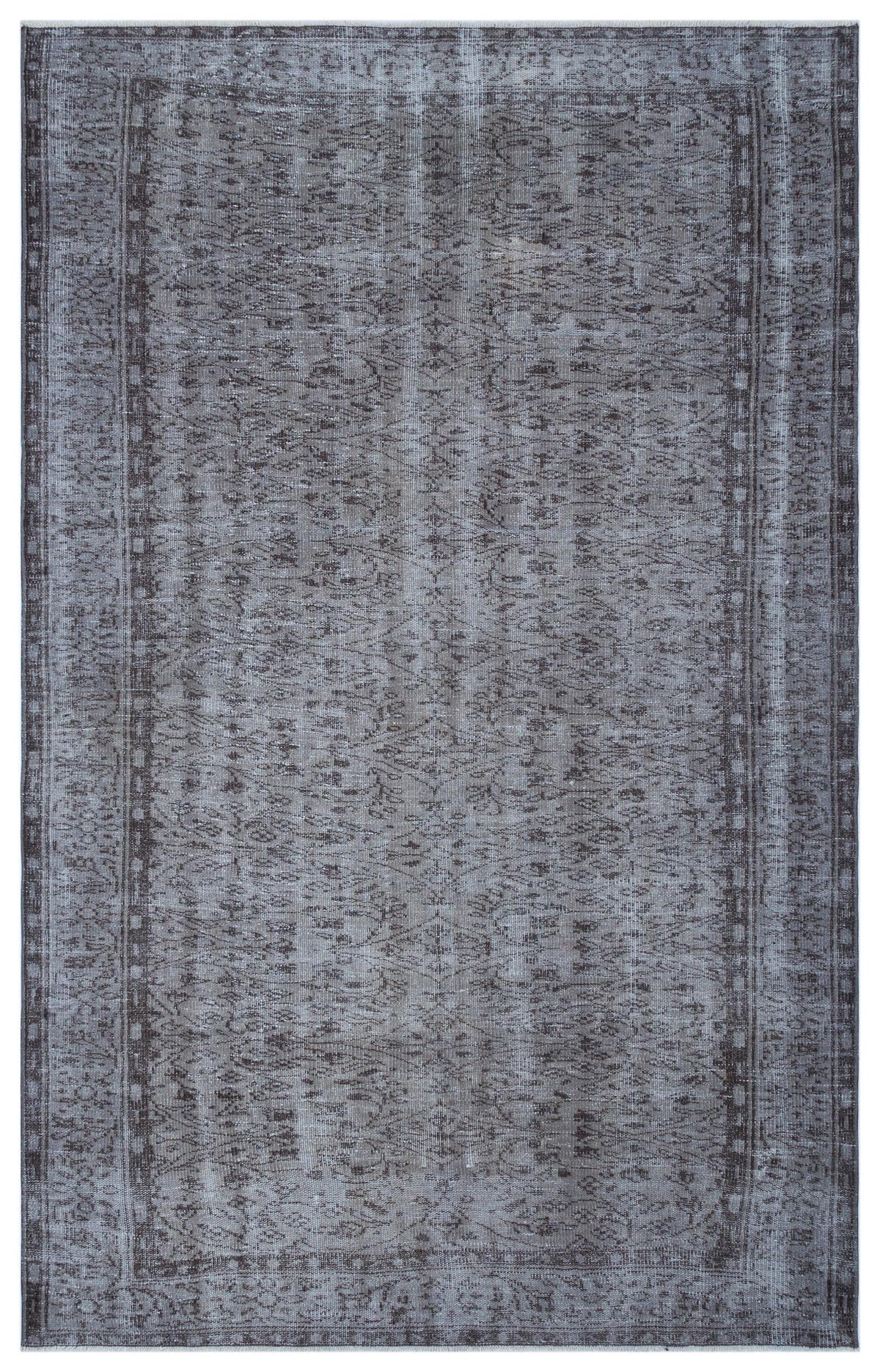 Charcoal and grey distressed vintage-style rug with a faded traditional floral medallion pattern.