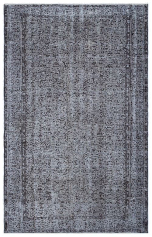 Load image 1 in gallery view. Charcoal and grey distressed vintage-style rug with a faded traditional floral medallion pattern.