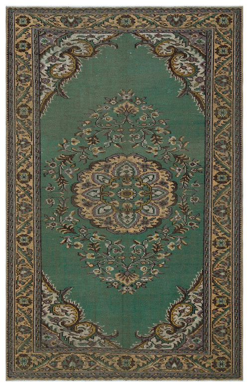 Load image 1 in gallery view. Emerald green traditional rug with a central floral medallion and ornate border in shades of beige, brown, and grey.