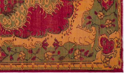 Load image 1 in gallery view. Traditional rug with a red, gold, and olive green floral medallion pattern and a geometric border.