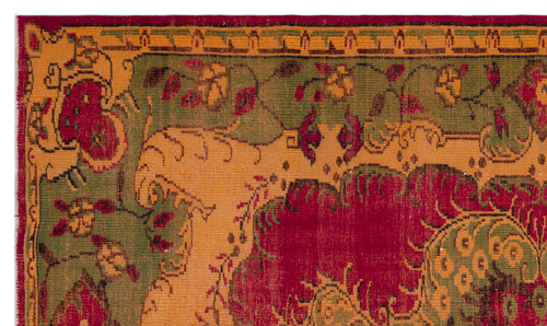 Load image 1 in gallery view. Traditional rug with a red, olive green, and gold floral medallion pattern and a geometric border.