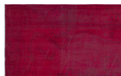Load image 1 in gallery view. Deep red vintage-style rug with a faint, tonal traditional medallion pattern and a linear border.