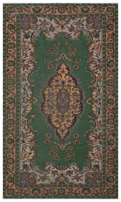 Load image 1 in gallery view. Emerald green traditional rug with a central floral medallion and ornate border in shades of purple, tan, and brown.