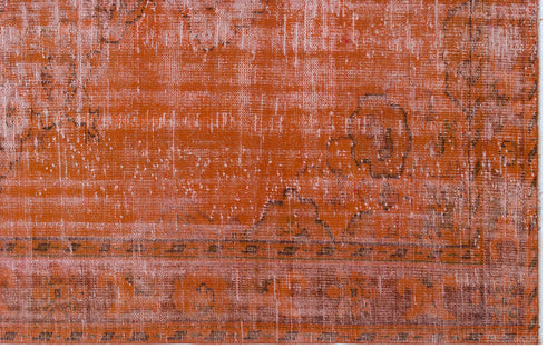 Load image 1 in gallery view. Burnt orange distressed rug with a faded traditional medallion pattern and a geometric border.