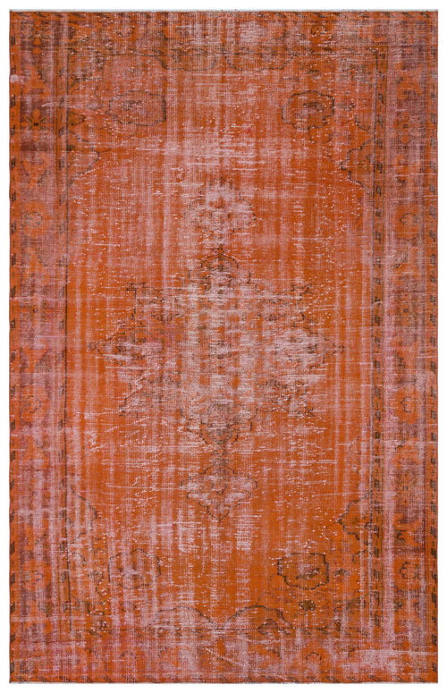 Load image 1 in gallery view. Burnt orange distressed rug with a faded central medallion and traditional border pattern.