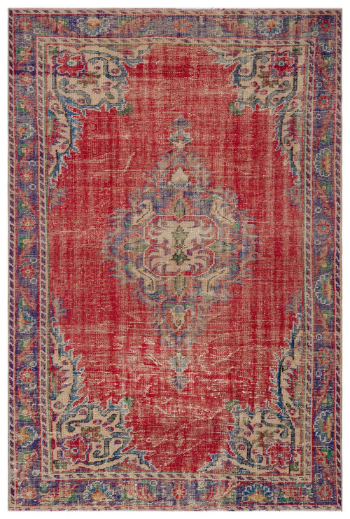 Load image 1 in gallery view. Distressed red traditional rug with a central floral medallion and blue and beige border accents.