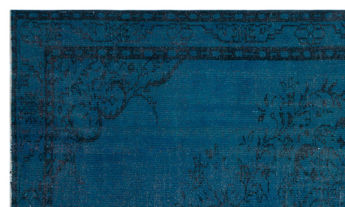 Load image 1 in gallery view. Teal and black traditional rug with a distressed floral medallion pattern and a geometric border.