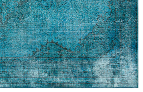 Load image 1 in gallery view. Teal and black distressed rug with a traditional ornate medallion pattern and a faded, weathered texture.