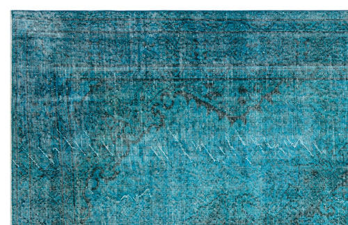 Load image 1 in gallery view. Teal and black distressed traditional rug with a faded, ornate medallion pattern.