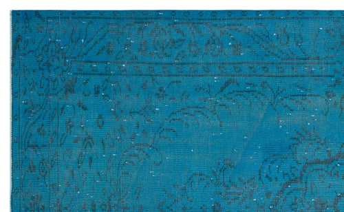 Load image 1 in gallery view. Teal rug with a dark grey distressed floral medallion pattern and a decorative border.