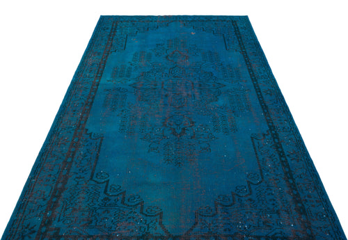 Load image 1 in gallery view. Teal vintage-style rug with a dark charcoal central medallion and ornate border on a white background.