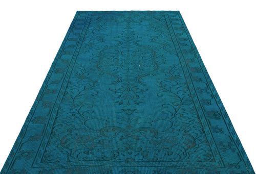 Load image 1 in gallery view. Teal runner rug with a dark, distressed traditional floral medallion pattern and a bordered edge.