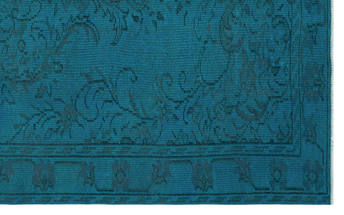 Load image 1 in gallery view. Teal rug with a dark, tone-on-tone traditional floral pattern and a geometric border.