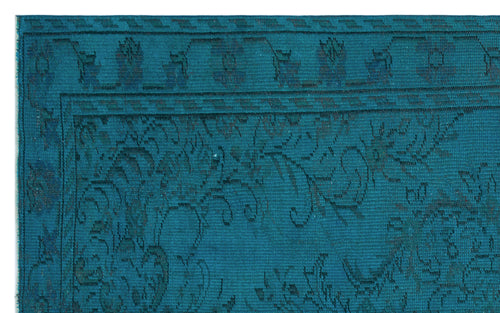 Load image 1 in gallery view. Teal rug with a dark blue traditional floral medallion pattern and a geometric border.