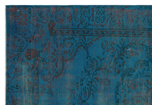 Load image 1 in gallery view. Teal and dark brown rug with a distressed, traditional floral medallion pattern.
