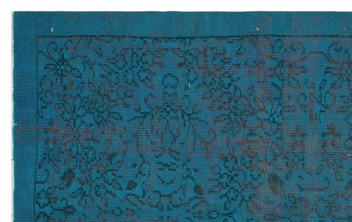 Load image 1 in gallery view. Teal rug with a distressed black floral pattern and visible weave texture.
