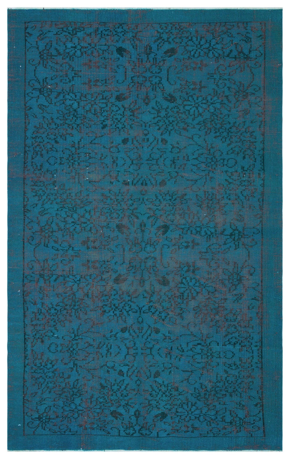 Teal rug with a dark, distressed floral medallion pattern and a solid border.
