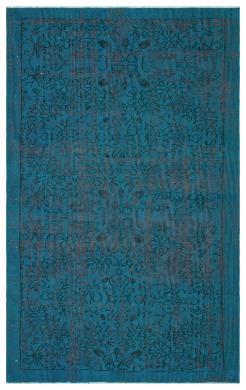 Load image 1 in gallery view. Teal rug with a dark, distressed floral medallion pattern and a solid border.